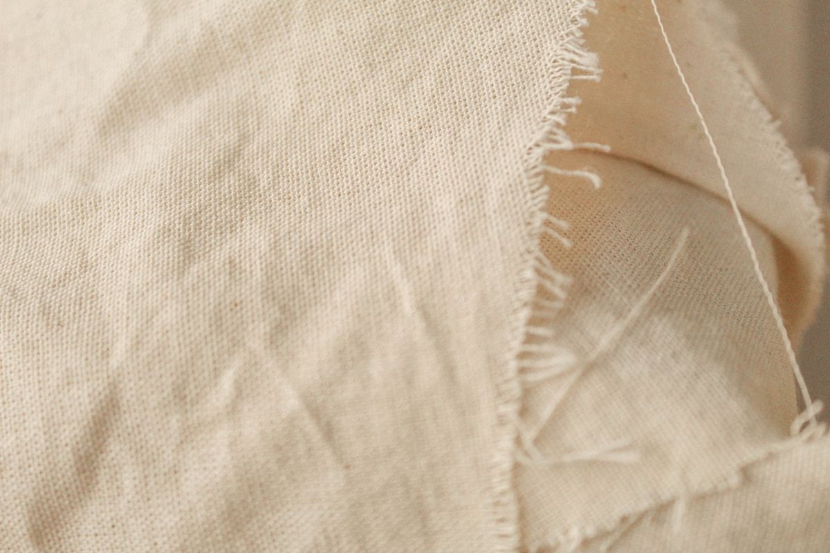 Close-up reference of plain-weave cotton canvas fabric