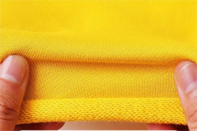Close-up of yellow rib knit trim