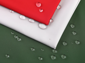 Water droplets on woven outerwear shell fabric